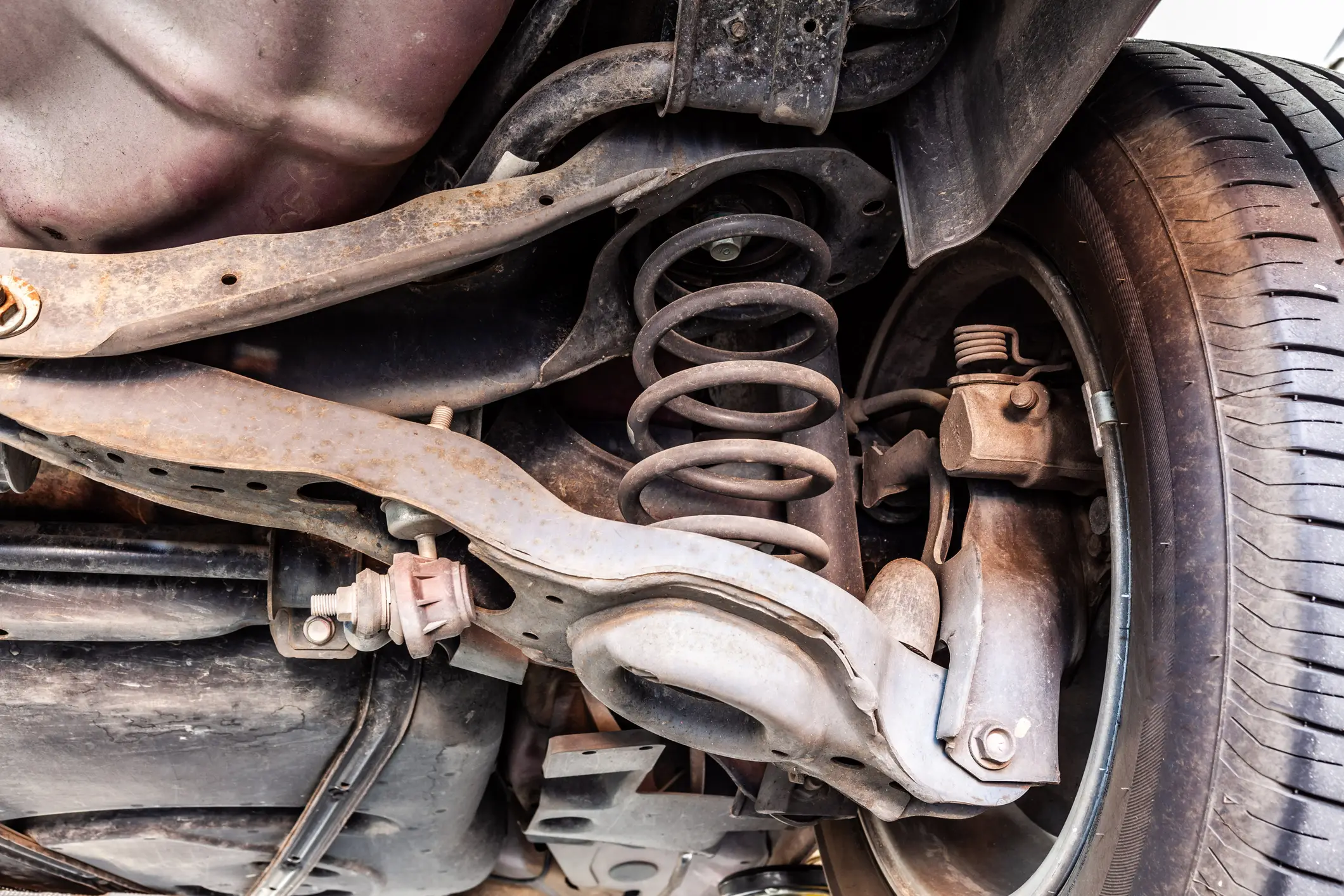 A defective car suspension.
