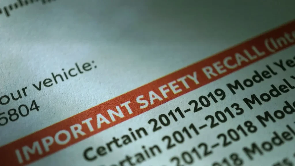 A close up of a vehicle recall letter.